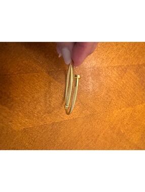 Gold Tone Cable Wire Bangle Bracelet with Screw Detail 558